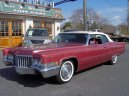 :  > Cadillac DeVille Convertible (Car: Cadillac DeVille Convertible)